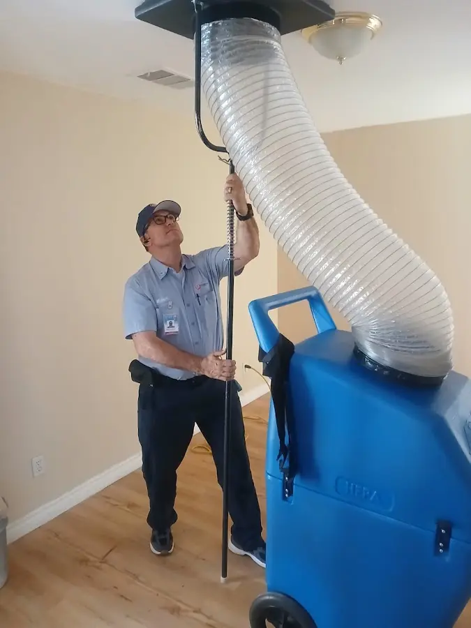 HVAC Installation technician using HEPA equipment in Ada